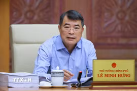 Thủ tướng Lê Minh Hưng chủ trì họp về dự án Luật sửa đổi, bổ sung một số điều của Luật Đất đai; Luật Nhà ở và Luật Kinh doanh bất động sản. (Ảnh: Dương Giang/TTXVN)