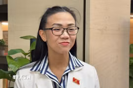 Đại biểu Trịnh Thị Tú Anh (Lâm Đồng) trả lời phỏng vấn. (Ảnh: Hải Ngọc/TTXVN)