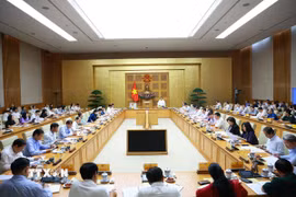 Cuộc họp giữa Đảng ủy Chính phủ và Đảng ủy Quốc hội nhằm chuẩn bị cho Kỳ họp thứ 10, Quốc hội khóa XV. (Ảnh: Dương Giang/TTXVN)