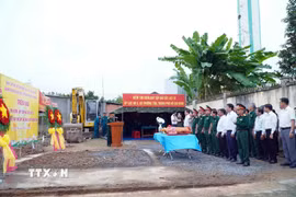Lễ triển khai tìm kiếm, quy tập hài cốt liệt sỹ tại ấp Lạc An, xã Thường Tân. (Ảnh: TTXVN phát)