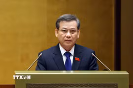 Chánh án Tòa án Nhân dân Tối cao Lê Minh Trí trình bày Báo cáo công tác nhiệm kỳ 2021-2026 của Tòa án Nhân dân Tối cao. (Ảnh: Phạm Kiên/TTXVN)