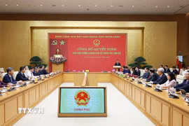 Lễ công bố quyết định của Thủ tướng Chính phủ về công tác cán bộ đối với Bộ Nội vụ và Bộ Dân tộc và Tôn giáo. (Ảnh: Dương Giang/TTXVN)