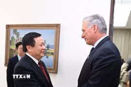 Bí thư thứ nhất, Chủ tịch Cuba Miguel Díaz-Canel Bermúdez tiếp ông Nguyễn Xuân Thắng, Ủy viên Bộ Chính trị, Giám đốc Học viện Chính trị Quốc gia Hồ Chí Minh, Chủ tịch Hội đồng Lý luận Trung ương. (Ảnh: Việt Hùng/TTXVN)