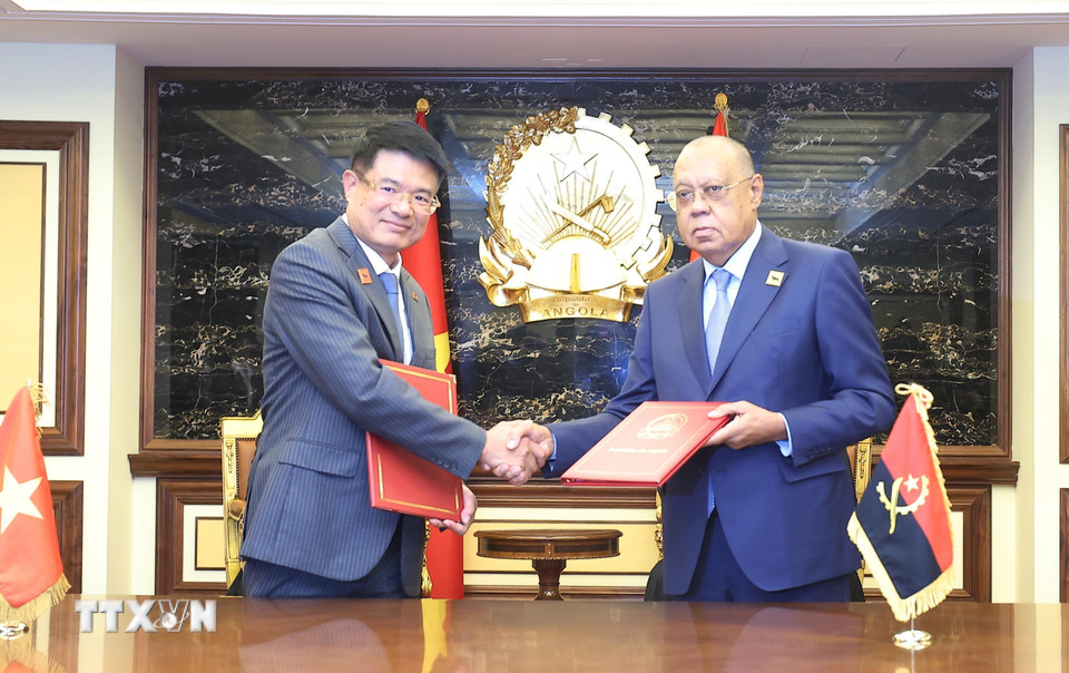 Lễ ký Hiệp định chuyển giao người bị kết án tù giữa Việt Nam và Angola. (Ảnh: Lâm Khánh/TTXVN)