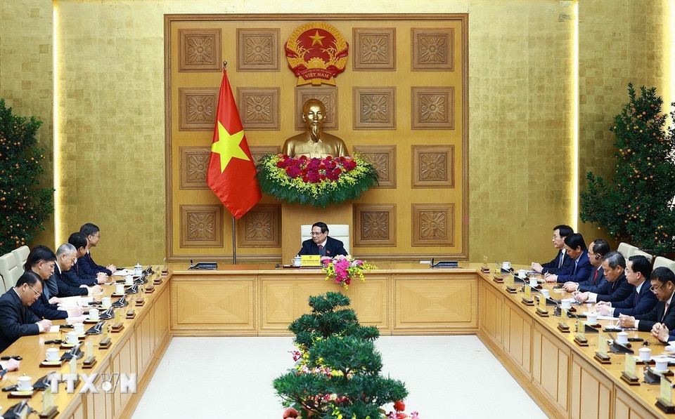 Thủ tướng Phạm Minh Chính tiếp đồng chí Trần Cương, Bí thư Khu ủy Quảng Tây (Trung Quốc). (Ảnh: Dương Giang/TTXVN)