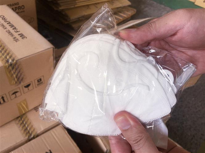 Phát hiện dây chuyền sản xuất khẩu trang loại 3M giả nhãn hiệu ảnh 1