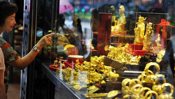 Giá vàng tiến gần tới quý tăng ấn tượng nhất trong gần 26 năm ảnh 1