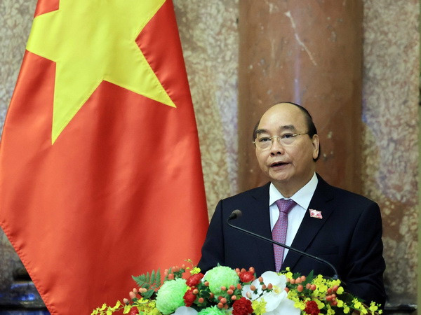 Chủ tịch nước Nguyễn Xuân Phúc lên đường thăm hữu nghị chính thức Lào ảnh 1