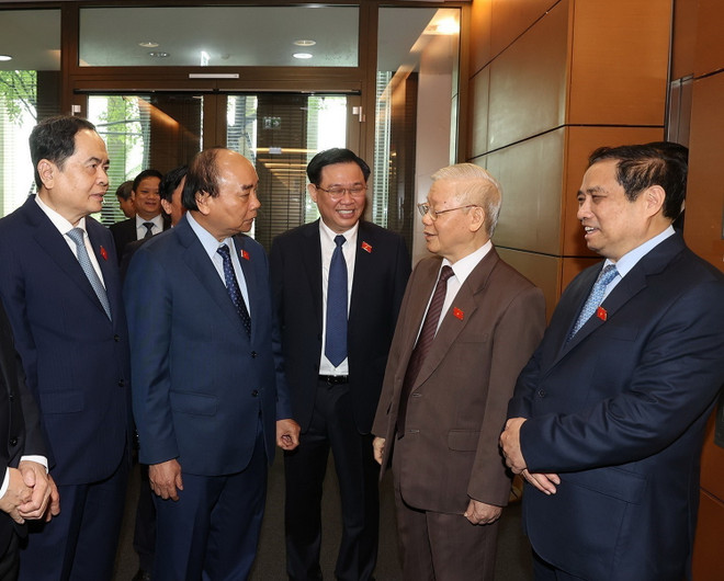 Tổng Bí thư Nguyễn Phú Trọng, Chủ tịch nước Nguyễn Xuân Phúc, Thủ tướng Chính phủ Phạm Minh Chính, Chủ tịch Quốc hội Vương Đình Huệ và Phó Chủ tịch Thường trực Quốc hội Trần Thanh Mẫn dự phiên khai mạc Kỳ họp thứ ba, Quốc hội khóa XV. (Ảnh: Trí Dũng/TTXVN) Hình ảnh Tổng Bí thư dự Lễ khai mạc Kỳ họp thứ 3, Quốc hội khóa XV ảnh 8