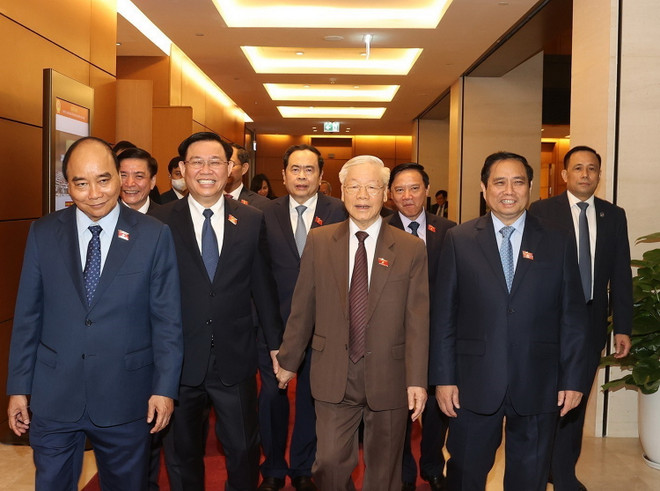 Tổng Bí thư Nguyễn Phú Trọng, Chủ tịch nước Nguyễn Xuân Phúc, Thủ tướng Chính phủ Phạm Minh Chính, Chủ tịch Quốc hội Vương Đình Huệ cùng các vị lãnh đạo Đảng, Nhà nước dự phiên khai mạc Kỳ họp thứ ba, Quốc hội khóa XV. (Ảnh: Trí Dũng/TTXVN) Hình ảnh Tổng Bí thư dự Lễ khai mạc Kỳ họp thứ 3, Quốc hội khóa XV ảnh 1