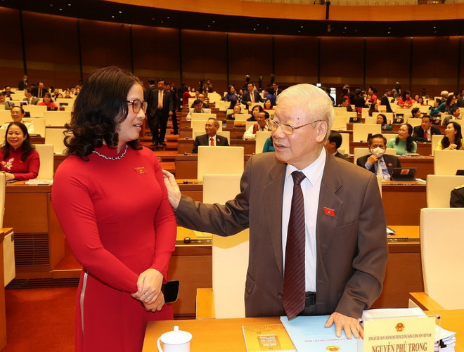 Tổng Bí thư Nguyễn Phú Trọng với các đại biểu dự phiên khai mạc Kỳ họp thứ ba, Quốc hội khóa XV. (Ảnh: Trí Dũng/TTXVN) Hình ảnh Tổng Bí thư dự Lễ khai mạc Kỳ họp thứ 3, Quốc hội khóa XV ảnh 10
