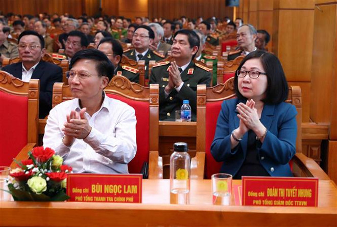 Các đại biểu tham dự buổi gặp mặt. (Ảnh: Phạm Kiên/TTXVN) Kỷ niệm 75 năm Ngày truyền thống xây dựng lực lượng Công an nhân dân ảnh 2