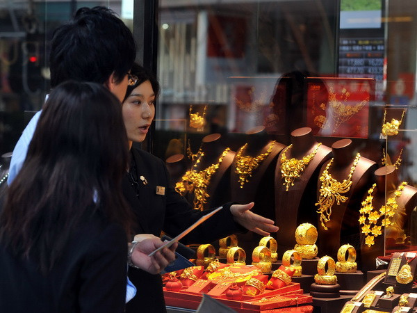 Giá vàng thế giới ước tăng 8,7% trong tháng 6 vừa qua ảnh 1