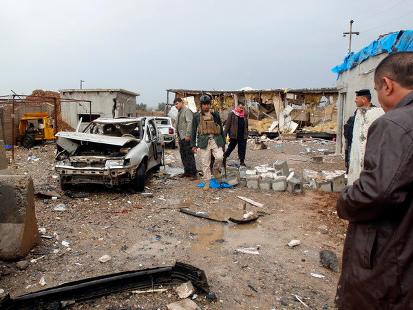 Bạo lực tiếp diễn tại Iraq, làm hơn 60 người thương vong ảnh 1