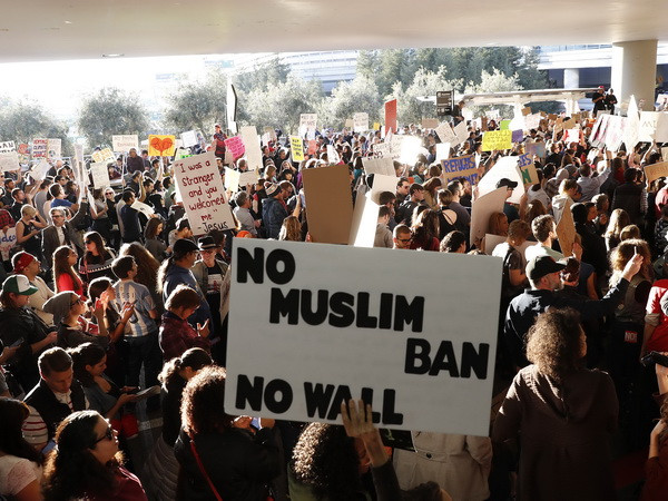 Canada tiếp nhận những người mắc kẹt vì bị cấm nhập cảnh vào Mỹ ảnh 1