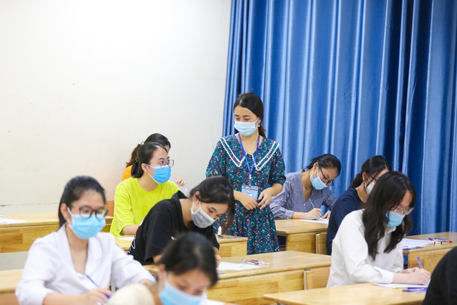 Học sinh dự thi tốt nghiệp trung học phổ thông năm 2021. (Ảnh: Minh Sơn/Vietnam+) Năm 2022: Trường ĐH tốp đầu đổi mới tuyển sinh, thêm ngành đào tạo ảnh 1