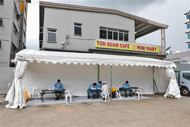 ''Giải mã'' sự bùng phát dịch COVID-19 tại Singapore ảnh 2