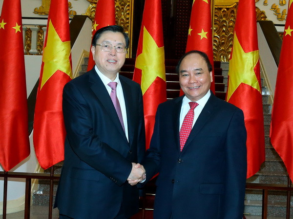 Thủ tướng Nguyễn Xuân Phúc tiếp Ủy viên trưởng Trương Đức Giang. (Ảnh: Thống Nhất/TTXVN) Thủ tướng Nguyễn Xuân Phúc tiếp Ủy viên trưởng Nhân đại Trung Quốc ảnh 1