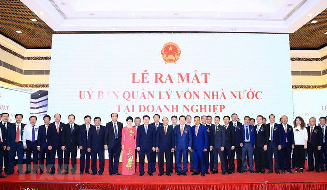 Thủ tướng Nguyễn Xuân Phúc và các đại biểu tại buổi lễ. (Ảnh: Thống Nhất/TTXVN) 10 sự kiện nổi bật của kinh tế Việt Nam năm 2018 do TTXVN bình chọn ảnh 6