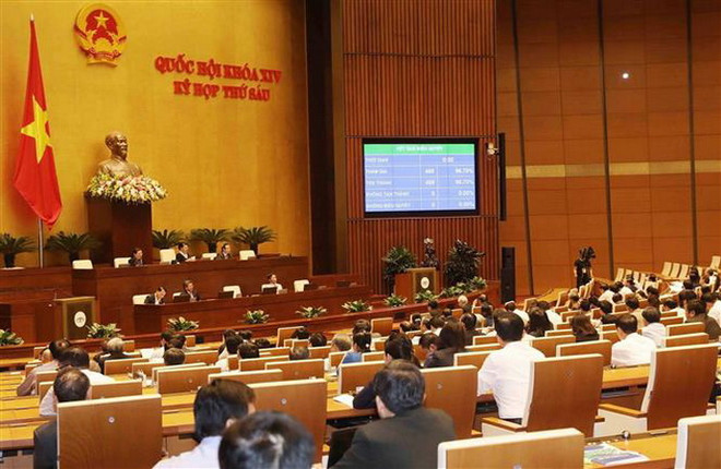 Chiều 12/11/2018, Quốc hội họp phiên toàn thể tại hội trường, biểu quyết thông qua Nghị quyết phê chuẩn CPTPP cùng các văn kiện liên quan. (Ảnh: Phương Hoa/TTXVN) 10 sự kiện nổi bật của kinh tế Việt Nam năm 2018 do TTXVN bình chọn ảnh 1