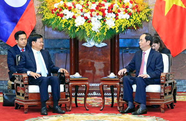 Chủ tịch nước Trần Đại Quang tiếp Thủ tướng Lào Thongloun Sisoulith ảnh 2