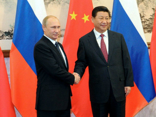 Lãnh đạo Nga, Trung có kế hoạch thăm lẫn nhau trong năm 2015 ảnh 1