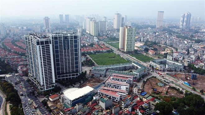 Các khu đô thị phía Tây Hà Nội đang được các nhà đầu tư tập trung xây dựng. (Ảnh: Tuấn Anh/TTXVN) Hà Nội: Thanh tra 392 đơn vị về chấp hành bảo vệ môi trường ảnh 2