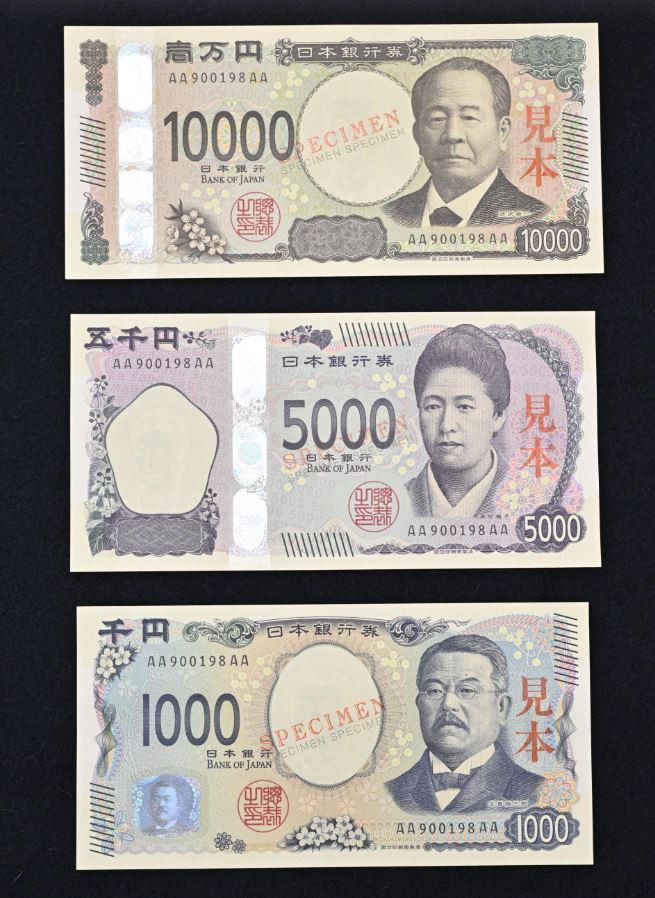 Các tờ tiền mệnh giá 10.000 yen, 5.000 yen và 1.000 yen mới. (Nguồn: Kyodo) 3006_dong yen moi.JPG