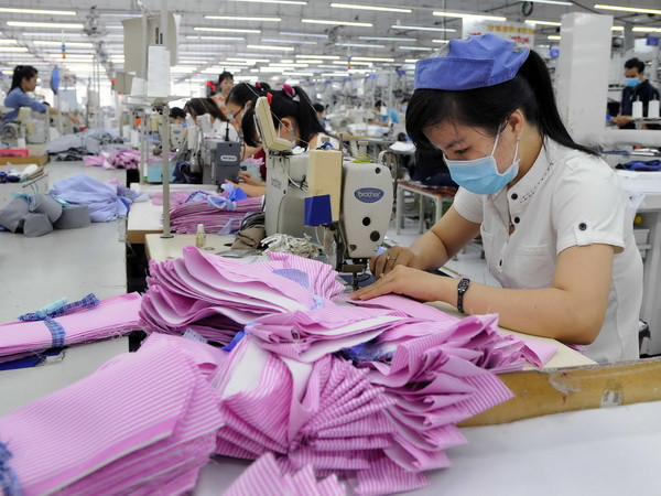 Kinh tế Việt Nam phục hồi sau "cơn choáng" từ hiệp ước TPP ảnh 1