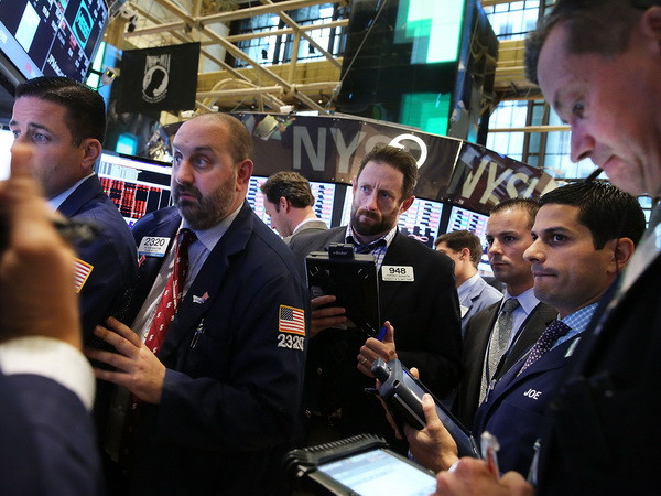 Phố Wall tăng giảm sau báo cáo từ thị trường nhà đất Mỹ ảnh 1