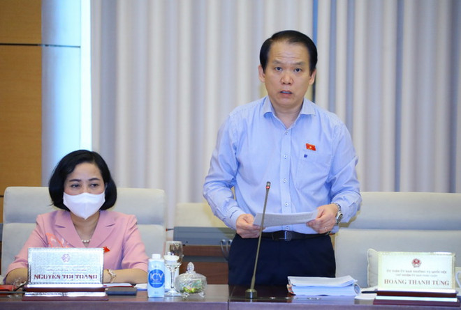 Chủ nhiệm Ủy ban Pháp luật của Quốc hội Hoàng Thanh Tùng trình bày báo cáo thẩm tra. (Ảnh: Nguyễn Điệp/TTXVN) Sửa đổi Luật Sở hữu trí tuệ, bảo đảm hài hòa lợi ích giữa các chủ thể ảnh 2