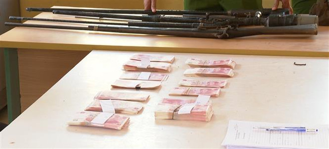 Điện Biên: Bắt giữ hai đối tượng tàng trữ và lưu hành tiền giả ảnh 1