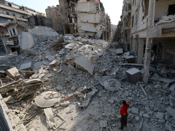 LHQ cáo buộc cả Chính phủ Syria và IS phạm tội ác chiến tranh ảnh 1