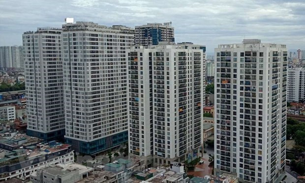 Toàn bộ các quy trình, thủ tục thuê, mua nhà ở xã hội được quy định đầy đủ trong các văn bản quy phạm pháp luật. (Ảnh: PV/Vietnam+) Cần nhận diện được năm nguyên nhân gây sốt đất hiện nay ảnh 2