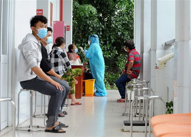 Long An điều chỉnh các biện pháp để thích ứng an toàn, kiểm soát dịch ảnh 1