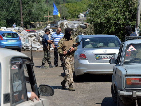 Giao tranh ở Ukraine lại ngăn cản công tác điều tra vụ máy bay MH17 ảnh 1