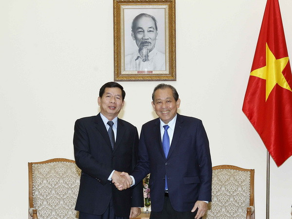 Phó Thủ tướng Trương Hòa Bình tiếp Chánh án Tòa án tối cao Lào ảnh 1