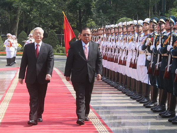 Tuyên bố chung nhân chuyến thăm của Tổng Bí thư, Chủ tịch nước Lào ảnh 1