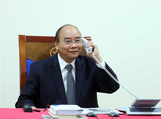 Thủ tướng Nguyễn Xuân Phúc. (Ảnh: Thống Nhất/TTXVN) Thủ tướng điện đàm với Lãnh đạo Tập đoàn dầu khí Exxon Mobil ảnh 1