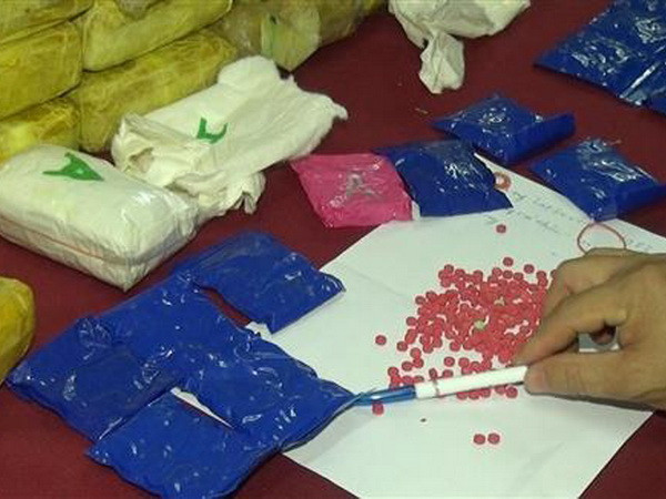 Bắt đối tượng mua bán 1 bánh heroin và hơn 7.500 viên ma túy tổng hợp ảnh 1
