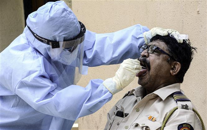 Cuộc chiến chống COVID-19: Bài kiểm tra năng lực của WHO ảnh 2