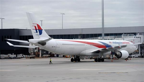 Máy bay của Hãng hàng không Malaysia Airlines tại sân bay Melbourne, Australia. (Nguồn: AFP/TTXVN) Malaysia sẽ sớm quyết định số phận của hãng Malaysia Airlines ảnh 1