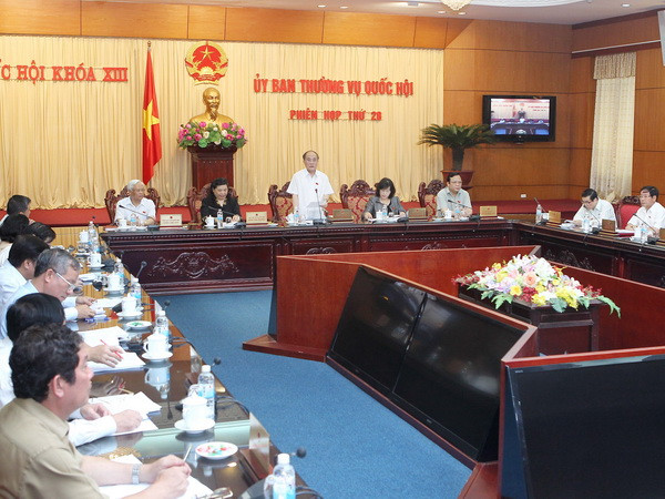 Khai mạc Phiên họp thứ 28 của Ủy ban Thường vụ Quốc hội khóa XIII. (Ảnh: Nhan Sáng/TTXVN) Phương án kéo dài hạn đăng ký giữ quốc tịch khó khả thi ảnh 1