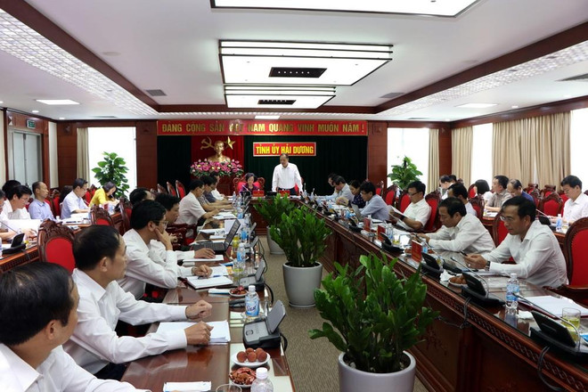 Quang cảnh buổi làm việc. (Ảnh: Mạnh Tú/TTXVN) Nâng cao đời sống dân là nhiệm vụ trọng tâm phát triển kinh tế-xã hội ảnh 1