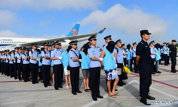 Trung Quốc dẫn độ 77 nghi phạm gian lận viễn thông từ Fiji ảnh 1