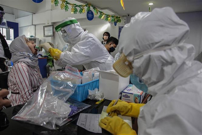 Dịch bệnh COVID-19 diễn biến phức tạp tại nhiều nước châu Á ảnh 1