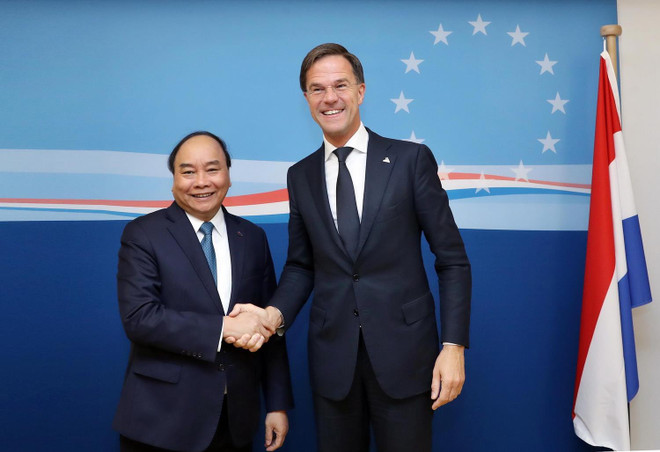Thủ tướng Nguyễn Xuân Phúc gặp song phương Thủ tướng Vương quốc Hà Lan, Ngài Mark Rutte bên lề Hội nghị Cấp cao Á-Âu (ASEM) lần thứ 12 tại Brussels (Vương quốc Bỉ) tháng 10/2018. (Ảnh: Thống Nhất/TTXVN) Thủ tướng Vương quốc Hà Lan sẽ thăm chính thức Việt Nam ảnh 1
