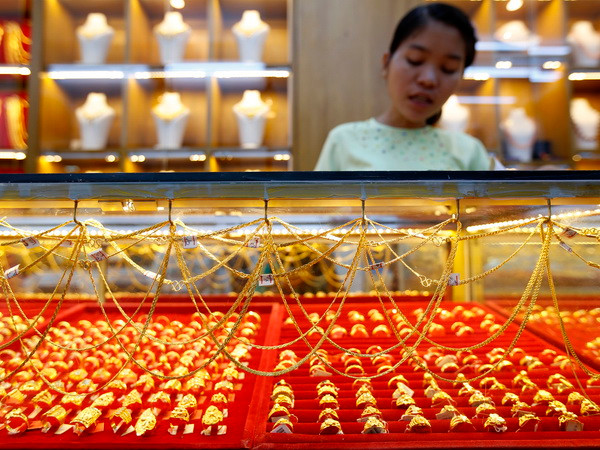 Giá vàng thế giới giảm xuống mức thấp nhất trong ba tuần ảnh 1