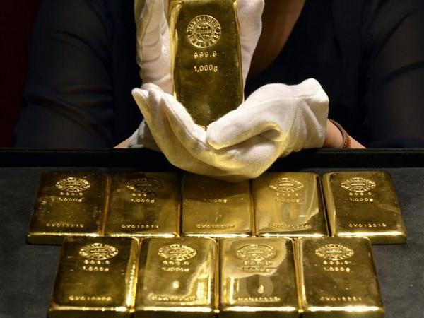 Giá vàng thế giới đi lên do đồng USD và chứng khoán mất đà ảnh 1