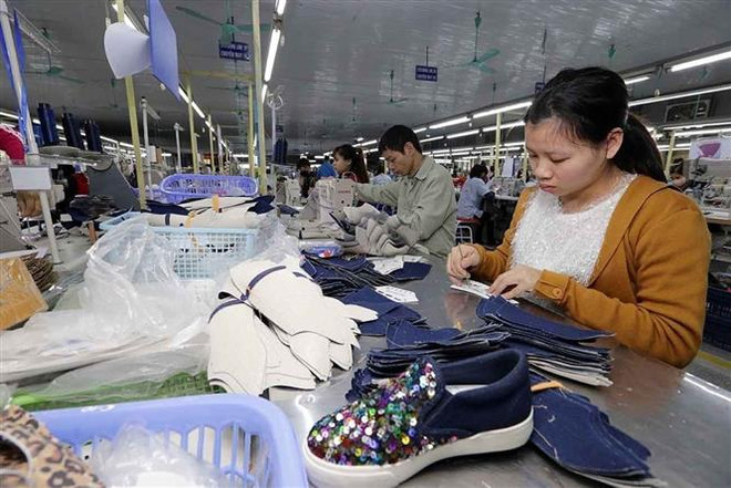 Hiệp định RCEP sẽ là cơ hội lớn cho cho ngành da giày của Việt Nam xuất khẩu sang thị trường EU. (Ảnh: TTXVN) Hiệp định RCEP được kỳ vọng mang lại cục diện mới, kết cấu mới ảnh 1